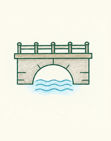 Светлый каменный мост с тёмными перилами над голубой водой.